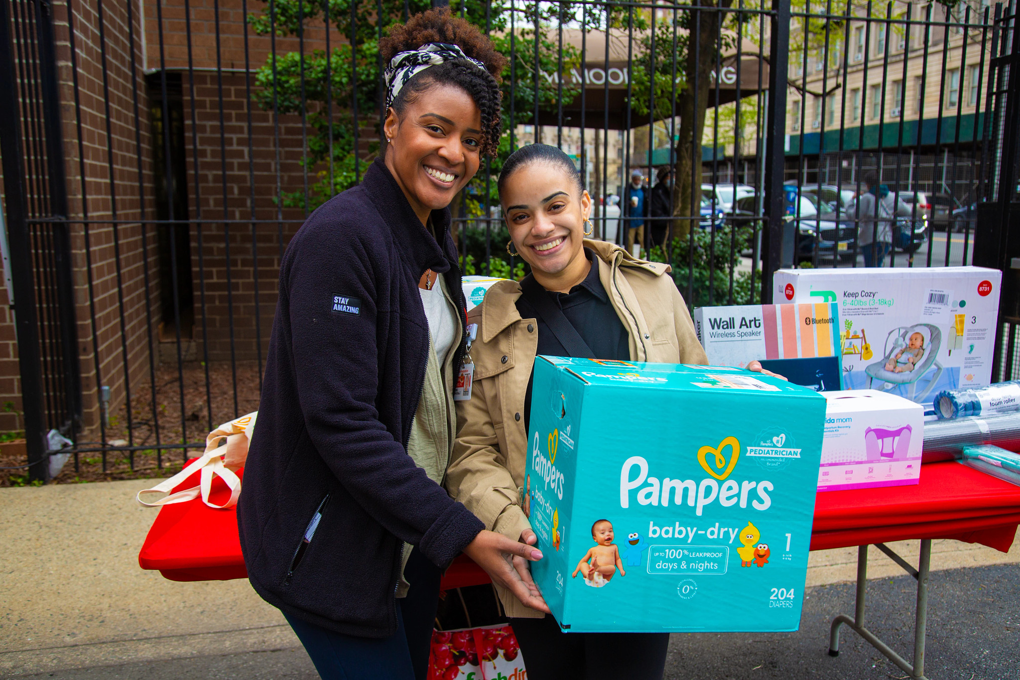 Tenesia Richards, Community Outreach Clinical Coordinator for the Division of Community & Population Health, with a patient
