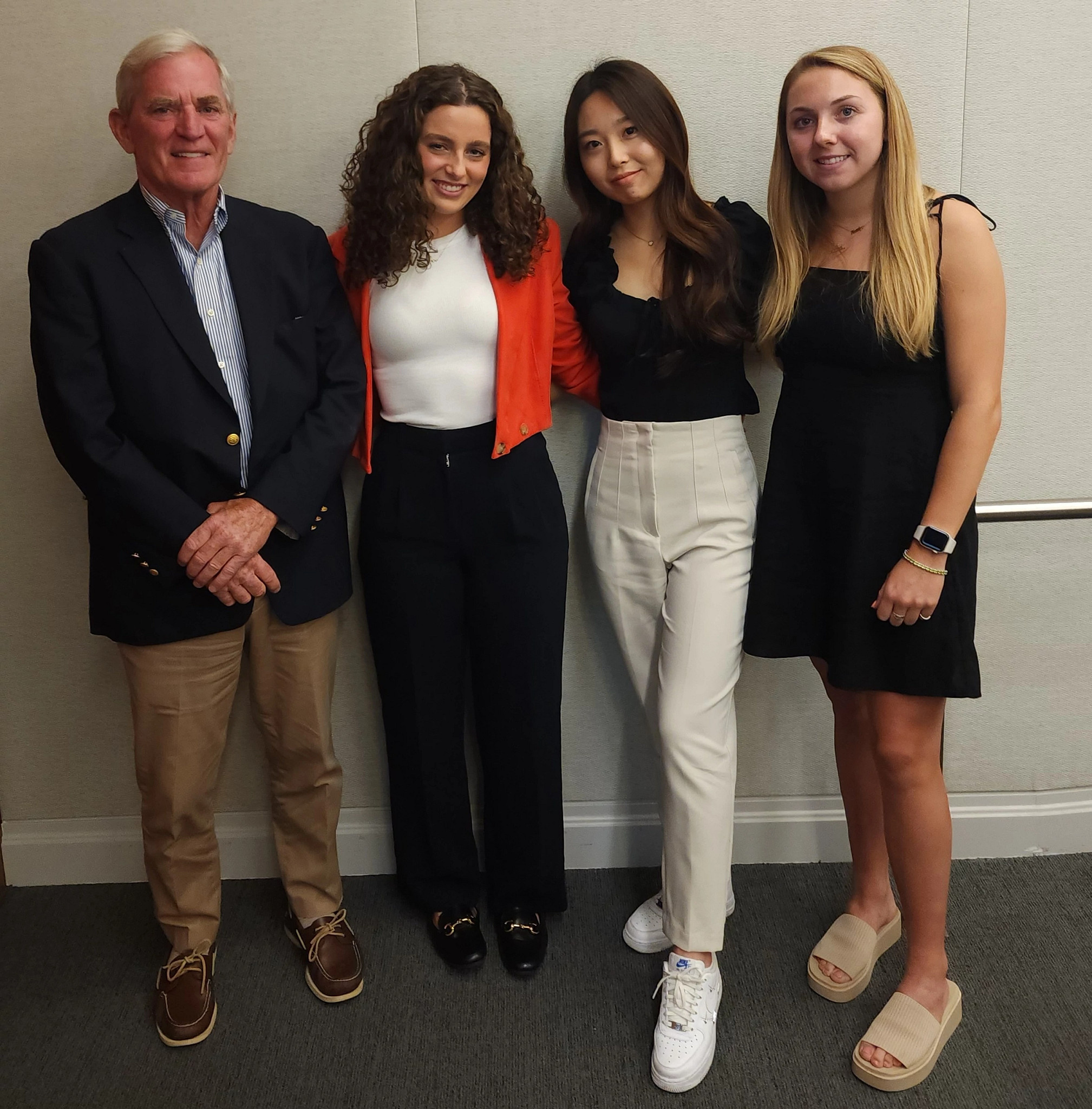 Fred Flynn with 2023 Flynn Fellowship graduates Sophia McDonald, Sally Gao, and Kaitlyn Mohr.&nbsp;