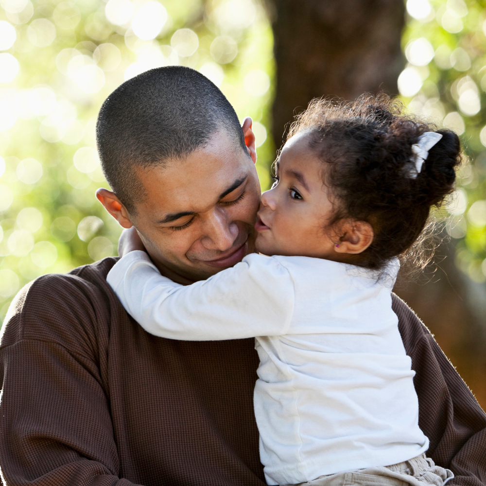 father and daughter embracing