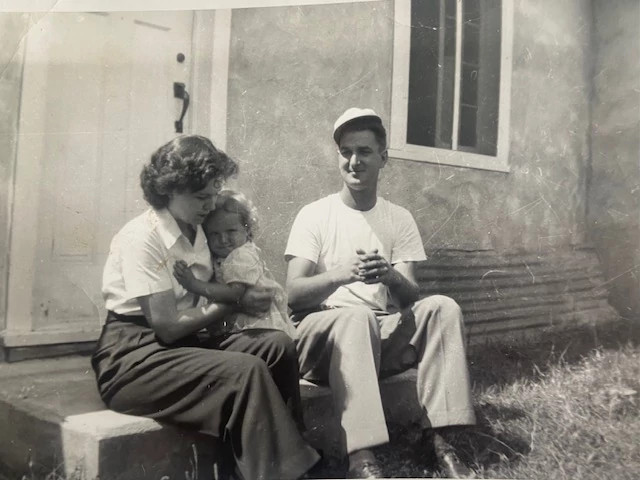 Kathleen McDole with her parents