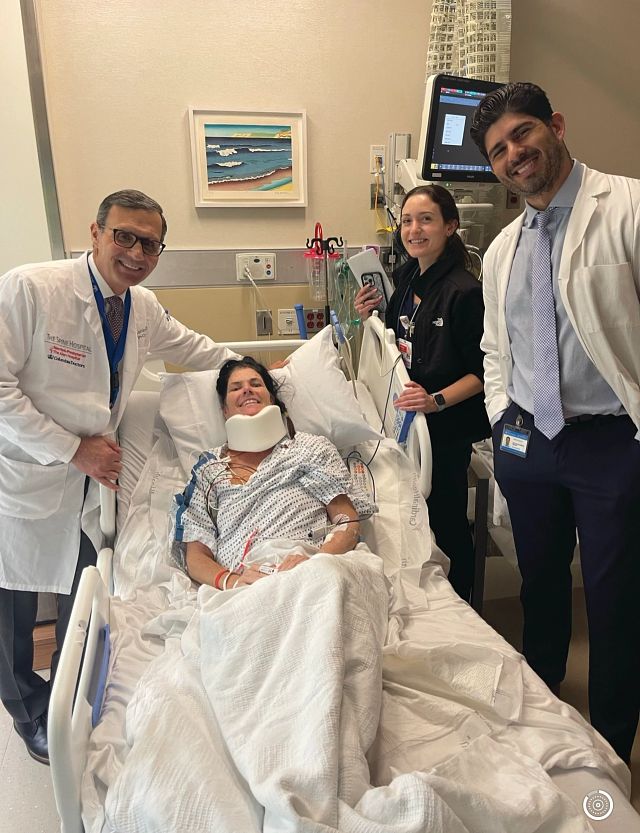 Nichole-Thomas-with-DrLenke-and-her care-team.jpeg