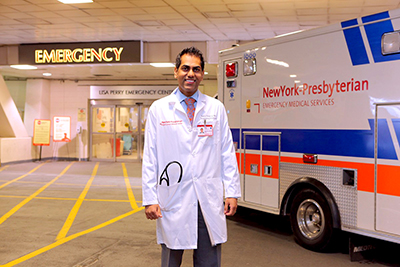 doctor standing next to an ambulance
