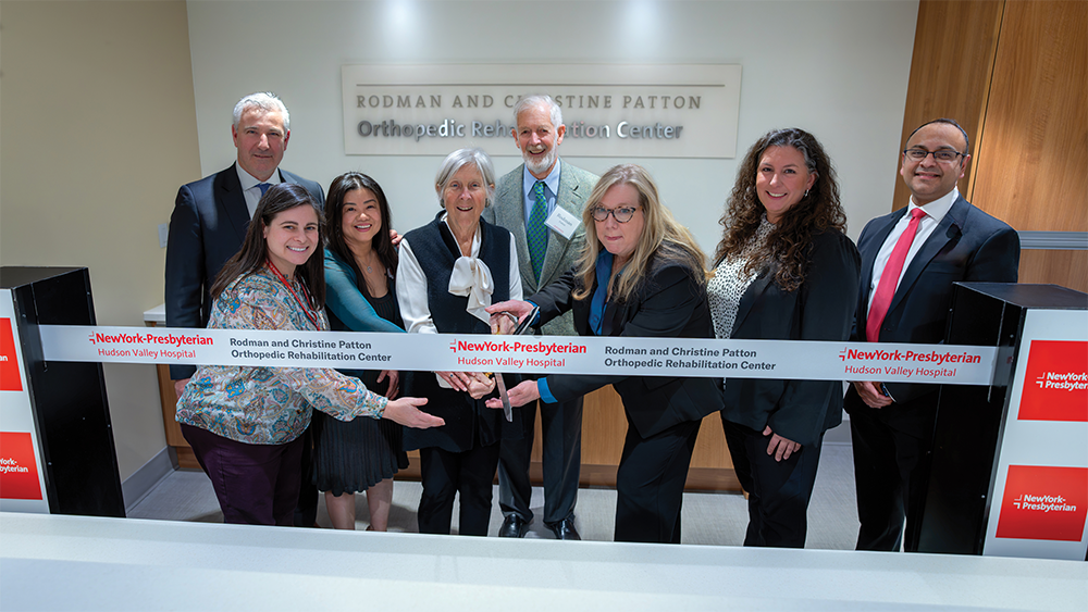 A group at a ribbon cutting.
