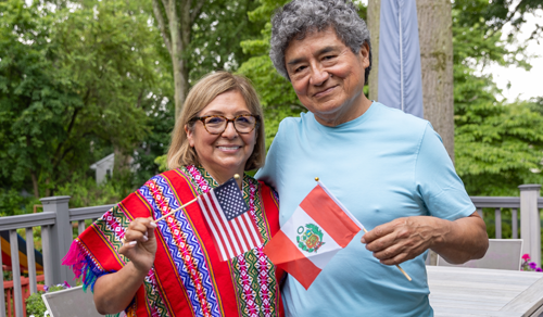 Lourdes waving the american flag