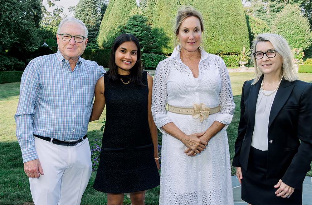 Small group of people outside.