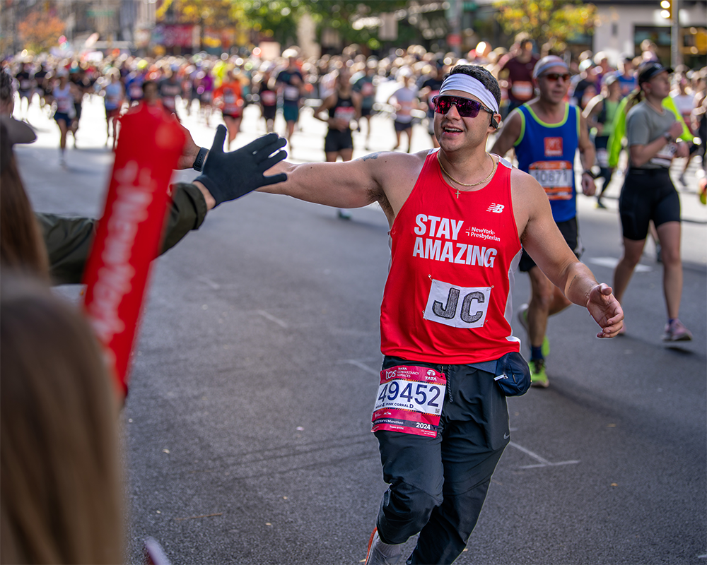 Man running in a marathon.