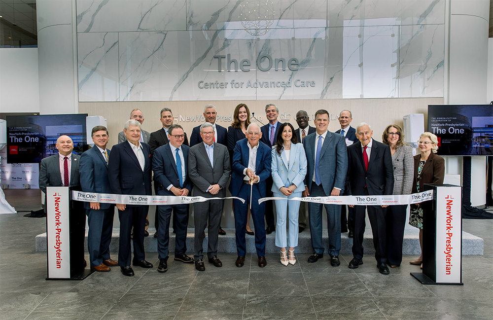 Group at a ribbon cutting.