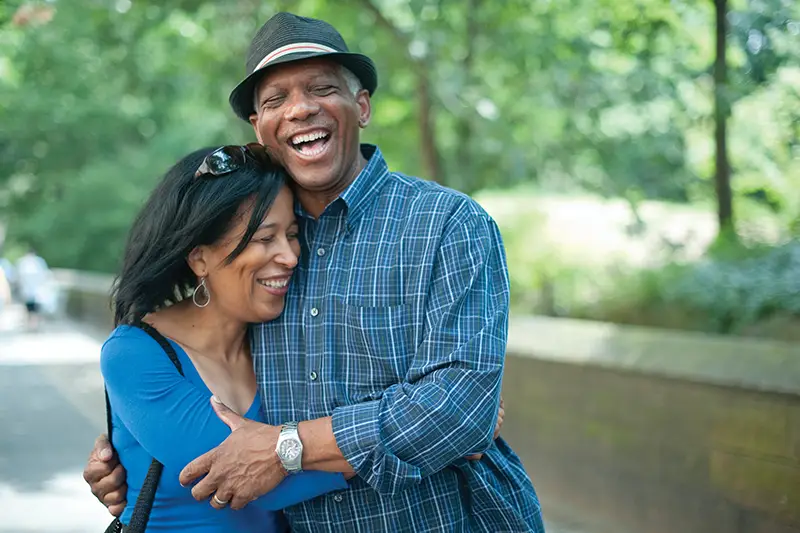 image of happy couple hugging